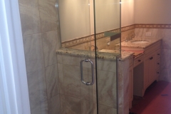 shower door with panel notched and a return panel